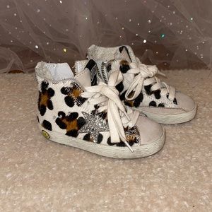 My daughter is 2 1/2 and she just grew out of them Toddler leopard, Golden Goose